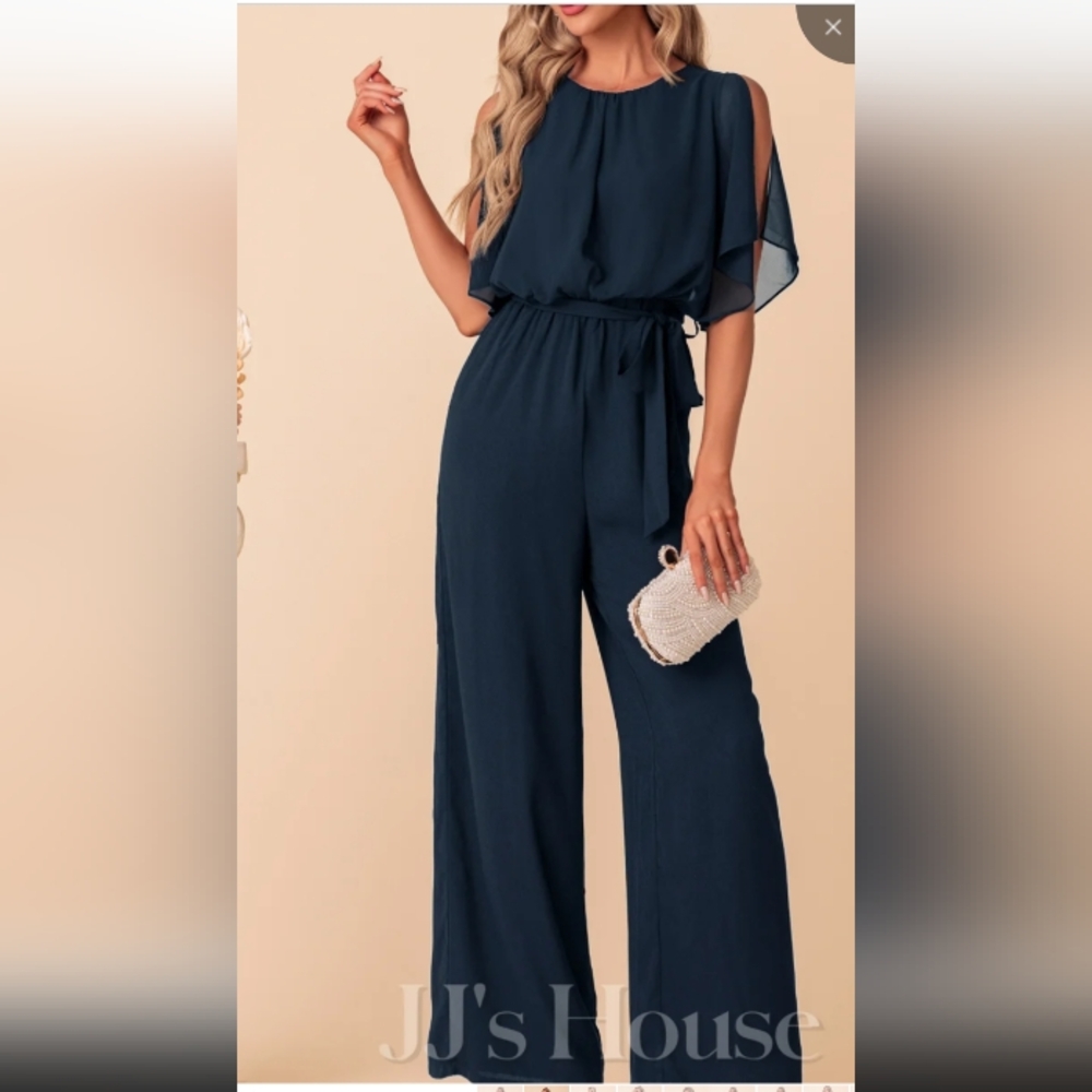 Navy blue jumpsuit with open flutter sleeves